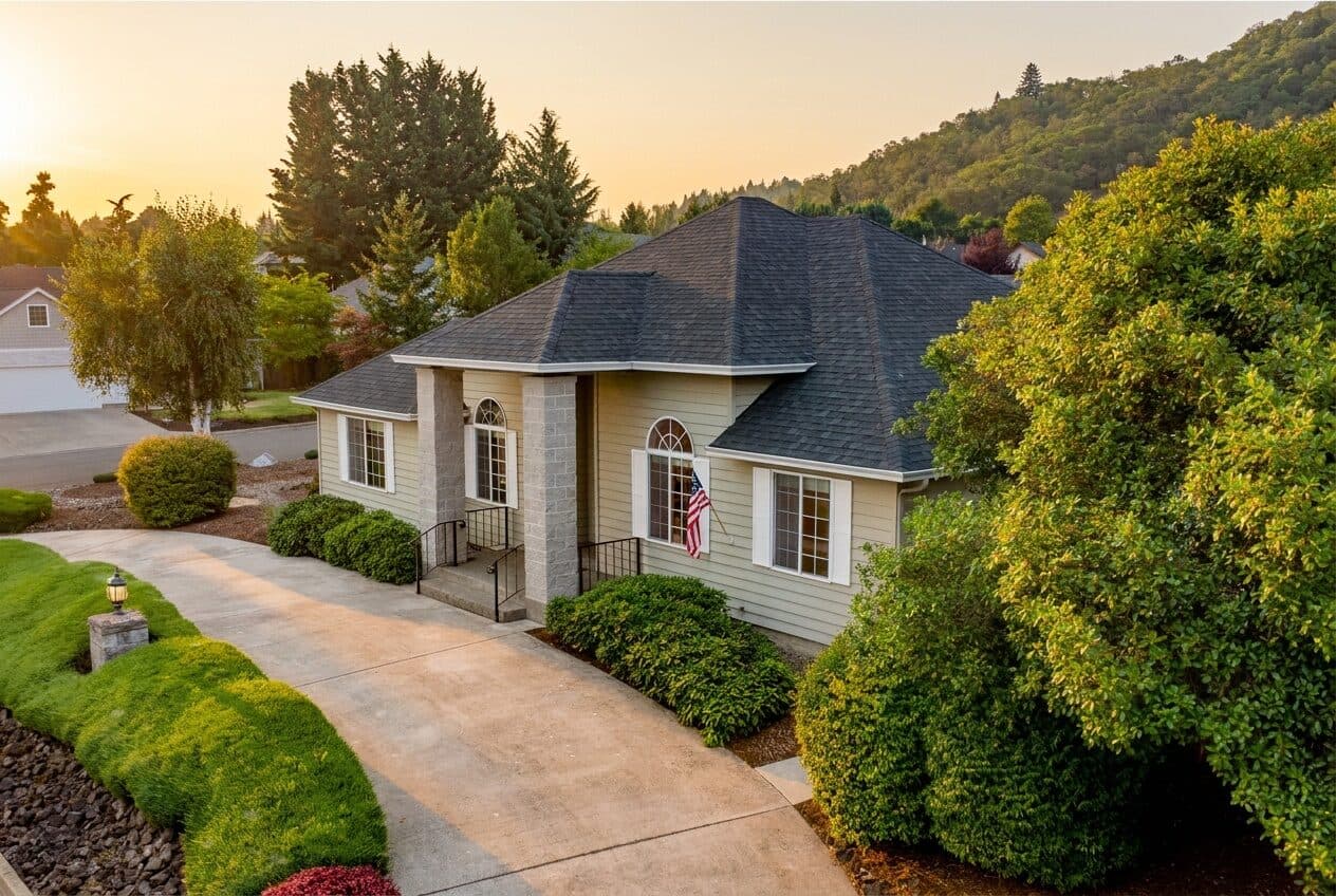 Aerial view of a single-story home at sunset — real estate photography by Hahn Media, Oregon